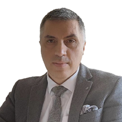 Portrait of Dr. Ugur Tamer